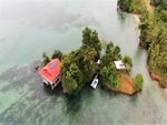 (IS-2390) VERY UNIQUE HOUSE BUILT OVER THE WATER BETWEEN TWO SMALL ISLANDS!